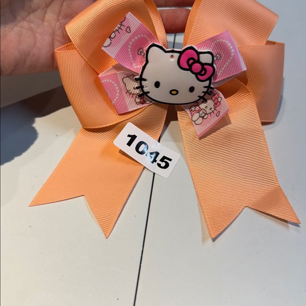 1045 Peach Color Hello Kitty Aligator Clip Hair Bow‎